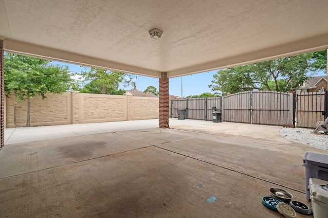 view of patio / terrace with a gate and fence private yard