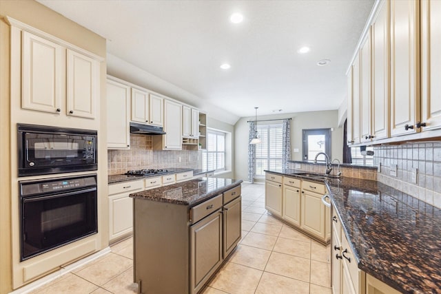 1519 Brookstone Ln, Sugar Land, TX 77479 - kitchen featuring black appliances, a sink, under cabinet range hood, tasteful backsplash, and recessed lighting
