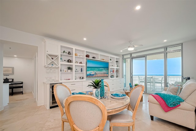 dining area featuring wine cooler, a ceiling fan, recessed lighting, and light tile patterned flooring
