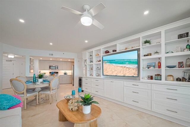 living area featuring wine cooler, ceiling fan, recessed lighting, and visible vents