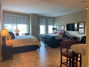 bedroom featuring tile patterned floors