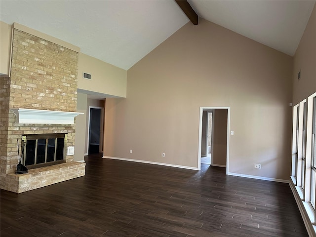 unfurnished living room featuring beamed ceiling, high vaulted ceiling, dark wood finished floors, and baseboards