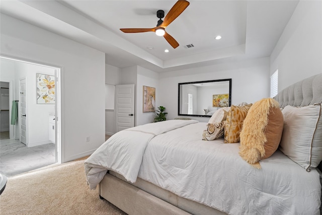 bedroom with ceiling fan, a raised ceiling, recessed lighting, baseboards, and visible vents