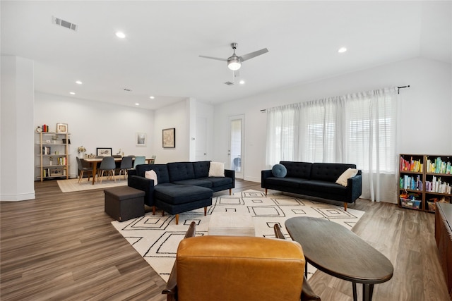 living room featuring visible vents, a ceiling fan, wood finished floors, and recessed lighting