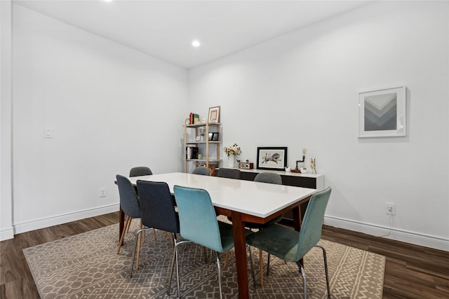 dining room featuring recessed lighting, baseboards, and dark wood-style floors