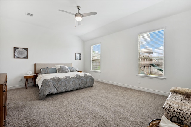 bedroom featuring baseboards, carpet, lofted ceiling, and visible vents
