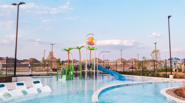 21239 Blue Bluff Dr, Cypress, TX 77433 - community pool with a water slide