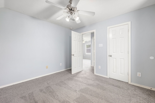 1811 Salt Valley Dr, Katy, TX 77493 - unfurnished bedroom with carpet floors, a ceiling fan, and baseboards