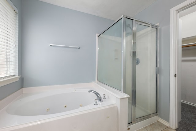 1811 Salt Valley Dr, Katy, TX 77493 - full bathroom featuring tile patterned floors, a stall shower, and a tub with jets