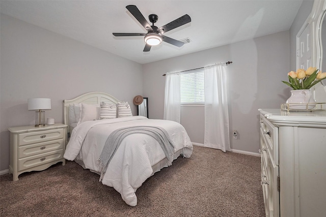 bedroom with carpet flooring, baseboards, visible vents, and ceiling fan