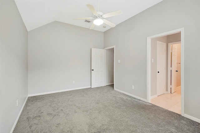 14010 Lakewood Crossing Blvd, Houston, TX 77070 - interior space featuring baseboards, visible vents, lofted ceiling, and light colored carpet