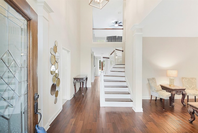 14010 Lakewood Crossing Blvd, Houston, TX 77070 - foyer with dark wood-style flooring, stairs, a ceiling fan, baseboards, and a towering ceiling