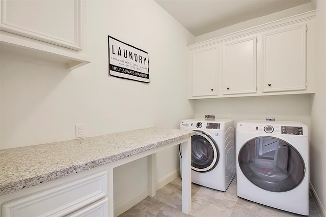 14010 Lakewood Crossing Blvd, Houston, TX 77070 - clothes washing area featuring washer and clothes dryer, cabinet space, and marble finish floor