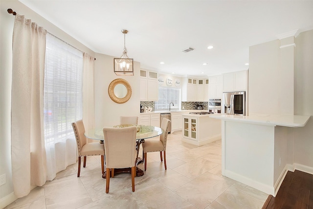 14010 Lakewood Crossing Blvd, Houston, TX 77070 - dining room featuring recessed lighting, baseboards, and visible vents