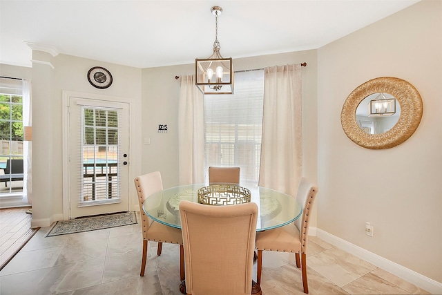 14010 Lakewood Crossing Blvd, Houston, TX 77070 - dining area with baseboards and an inviting chandelier