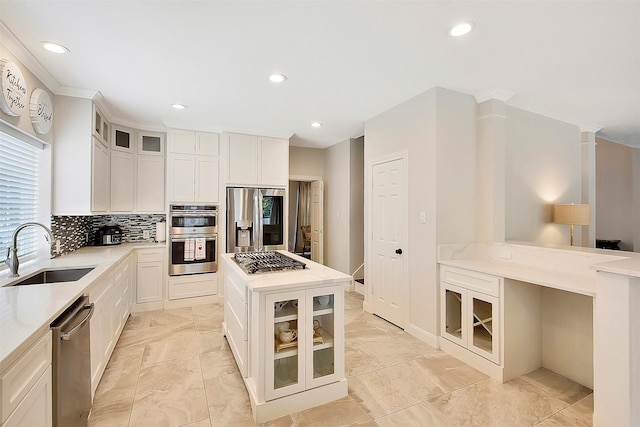 14010 Lakewood Crossing Blvd, Houston, TX 77070 - kitchen with a sink, backsplash, light stone countertops, and stainless steel appliances