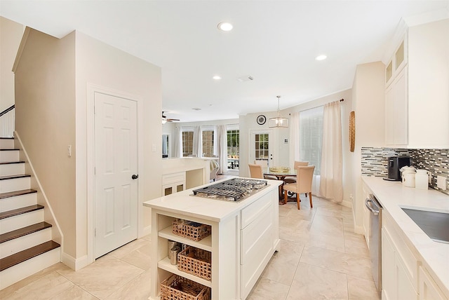 14010 Lakewood Crossing Blvd, Houston, TX 77070 - kitchen featuring light countertops, white cabinets, and recessed lighting