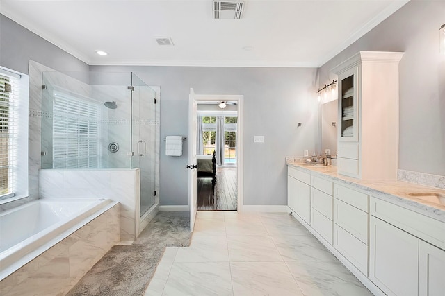 14010 Lakewood Crossing Blvd, Houston, TX 77070 - bathroom featuring double vanity, a garden tub, visible vents, crown molding, and marble finish floor