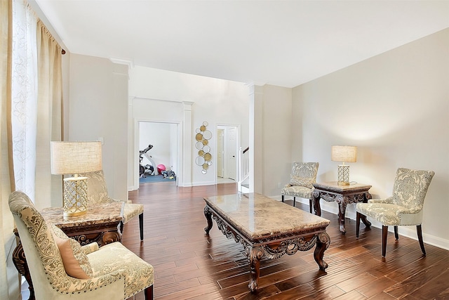 14010 Lakewood Crossing Blvd, Houston, TX 77070 - sitting room featuring ornate columns, dark wood-style flooring, and baseboards