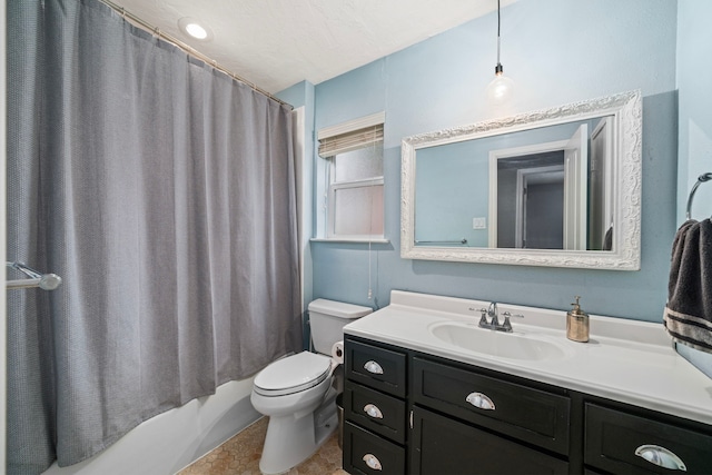 bathroom featuring vanity, toilet, and shower / tub combo with curtain
