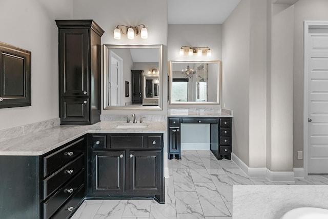 full bath with vanity and marble finish floor
