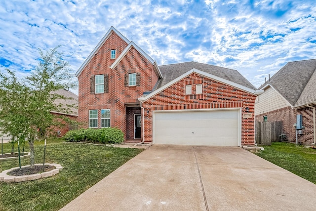 traditional home featuring concrete driveway, brick siding, a garage, and a front lawn