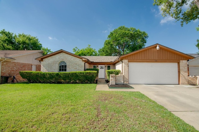 ranch-style home with brick siding, driveway, a front lawn, and a garage