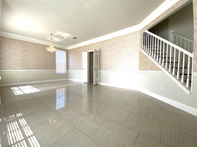 unfurnished room with marble finish floor, visible vents, crown molding, an inviting chandelier, and wallpapered walls