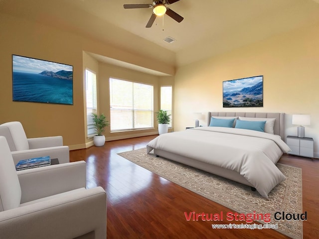 bedroom with lofted ceiling, a ceiling fan, baseboards, visible vents, and wood finished floors