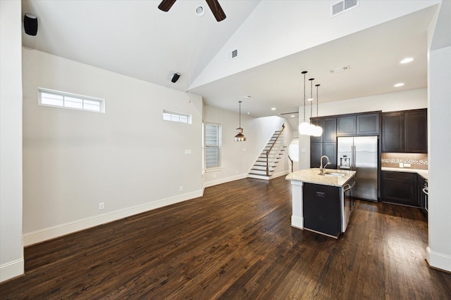 kitchen featuring visible vents, a ceiling fan, appliances with stainless steel finishes, and dark wood-type flooring