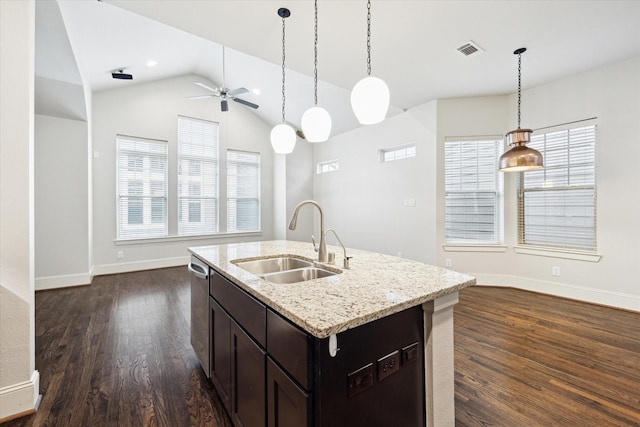 kitchen with visible vents, a sink, ceiling fan, and dark wood-style floors