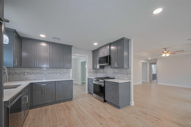 kitchen featuring visible vents, recessed lighting, baseboards, and appliances with stainless steel finishes