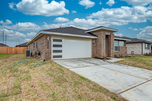 3907 Itzle Island Ct, Katy, TX 77494 - view of front of property with driveway, a garage, brick siding, fence, and cooling unit