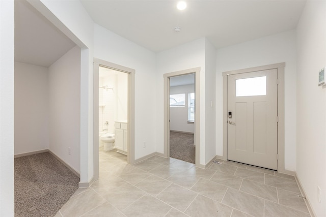 3907 Itzle Island Ct, Katy, TX 77494 - foyer with baseboards and light tile patterned floors