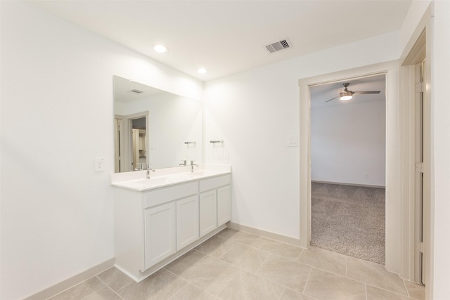 3907 Itzle Island Ct, Katy, TX 77494 - bathroom featuring double vanity, ceiling fan, visible vents, a sink, and baseboards