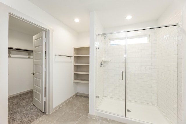3907 Itzle Island Ct, Katy, TX 77494 - full bathroom featuring recessed lighting, tile patterned floors, a spacious closet, and a shower stall