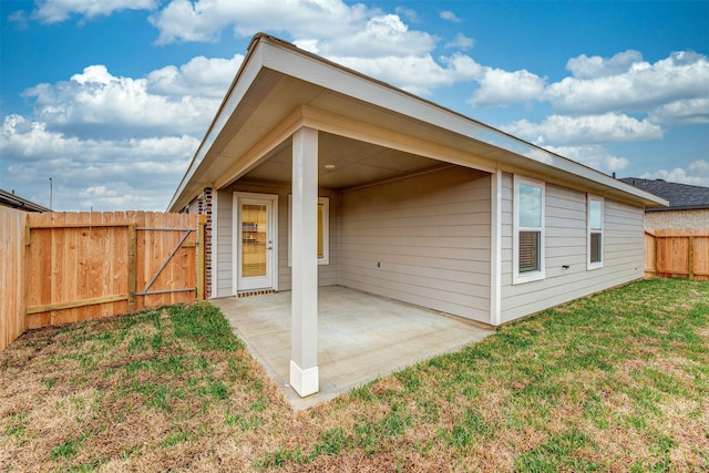 3907 Itzle Island Ct, Katy, TX 77494 - rear view of property featuring a yard, a fenced backyard, and a patio area