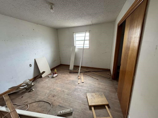 unfurnished bedroom featuring a textured ceiling
