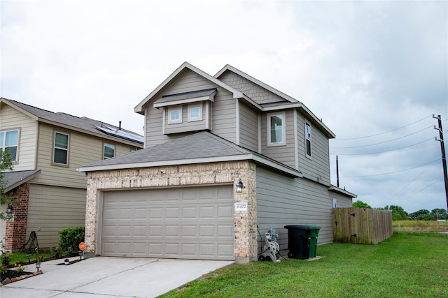 view of front of home featuring a garage, fence, a front yard, and concrete driveway