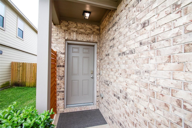 property entrance featuring fence