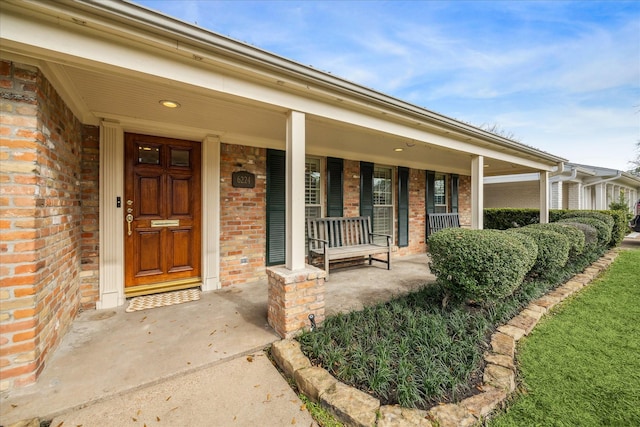 6224 Overbrook Ln, Houston, TX 77057 - entrance to property with a porch and brick siding