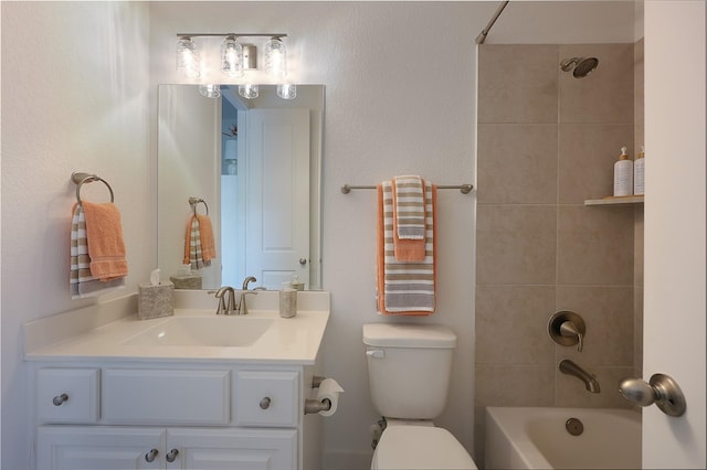 bathroom with vanity, toilet, and tub / shower combination