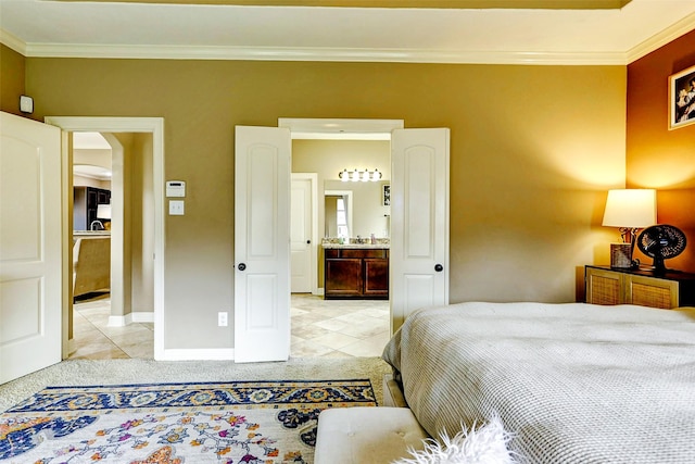 bedroom featuring crown molding, baseboards, light tile patterned floors, and light colored carpet