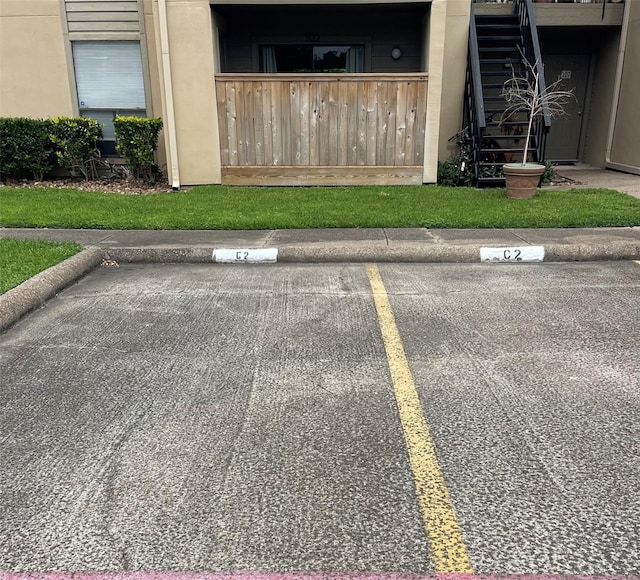 uncovered parking lot with stairway
