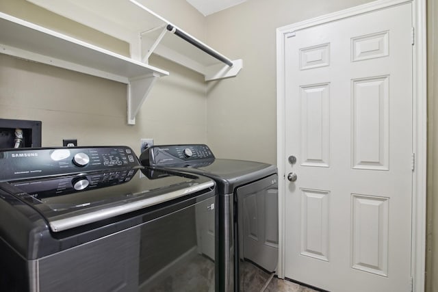 21894 Pinewilde Ct, Porter, TX 77365 - laundry room featuring separate washer and dryer and laundry area