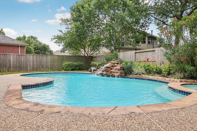 view of swimming pool featuring a fenced in pool and a fenced backyard