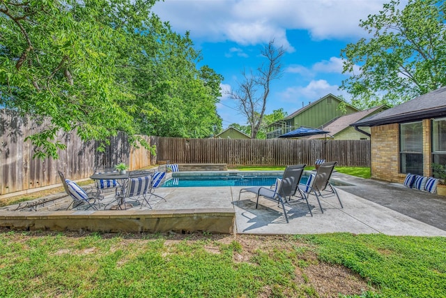 view of swimming pool featuring a fenced in pool, a fenced backyard, and a patio area