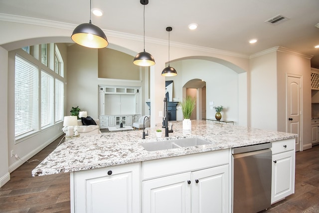 19019 Kimber Creek Ln, Cypress, TX 77429 - kitchen with a sink, dishwasher, arched walkways, light stone countertops, and crown molding