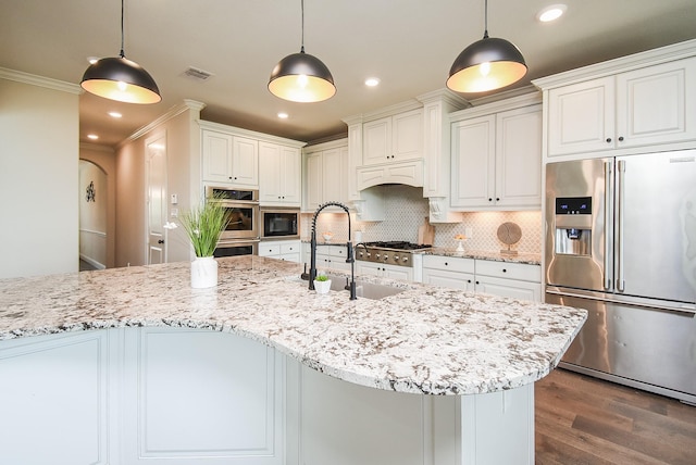 19019 Kimber Creek Ln, Cypress, TX 77429 - kitchen featuring appliances with stainless steel finishes, a sink, ornamental molding, backsplash, and dark wood-style flooring