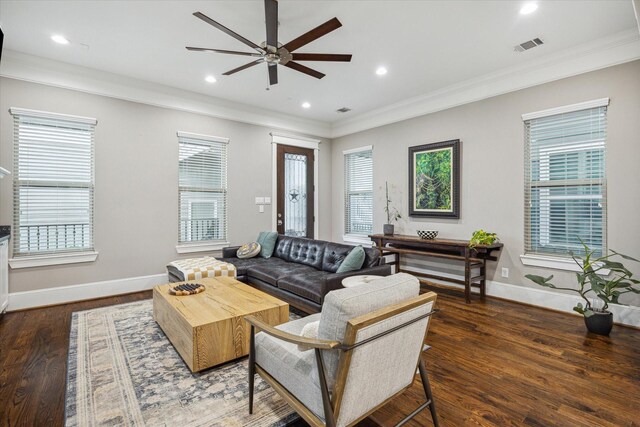 living area featuring recessed lighting, ceiling fan, visible vents, and ornamental molding